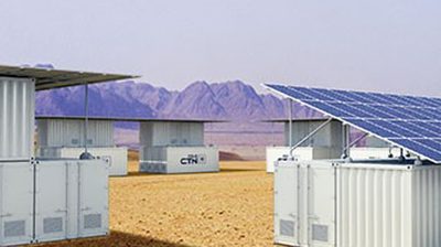 Containerised power systems installed alongside a ground-mounted solar array